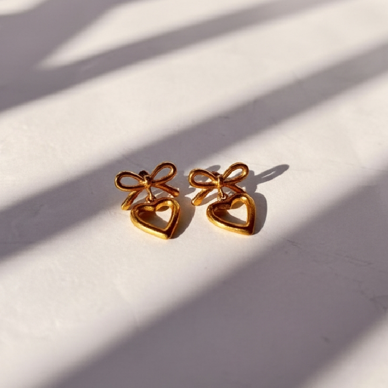 GOLDEN BOW AND HEART DROPS